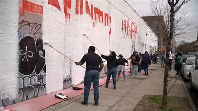 Removing graffiti from the wall