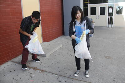 The students are cleaning the campus area